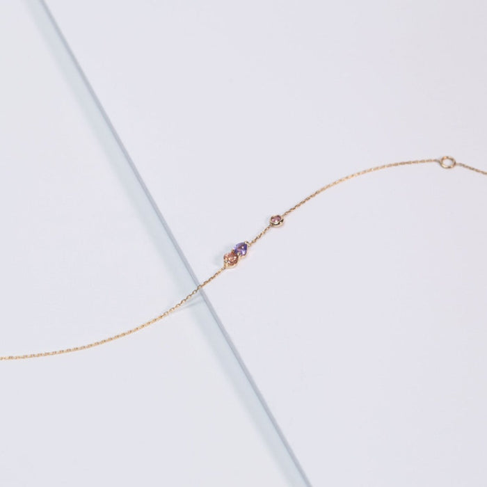 Bracelet en Or jaune décoré d'un subtil mélange de Saphirs orange et violet | Bijoux femme | La Ruée