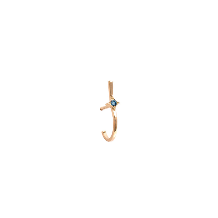Boucle d'oreille créole en or jaune et étoile incrusté d'une aigue-marine réalisée par Horah vendue sur la Ruée